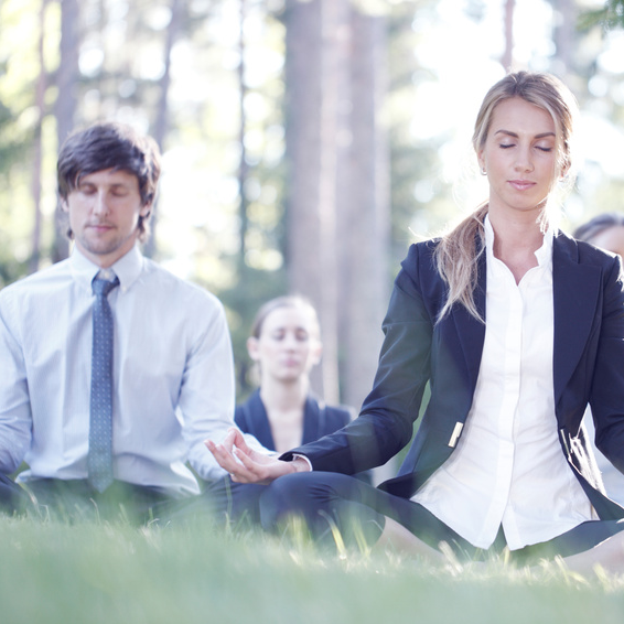 meditating Businessmen
